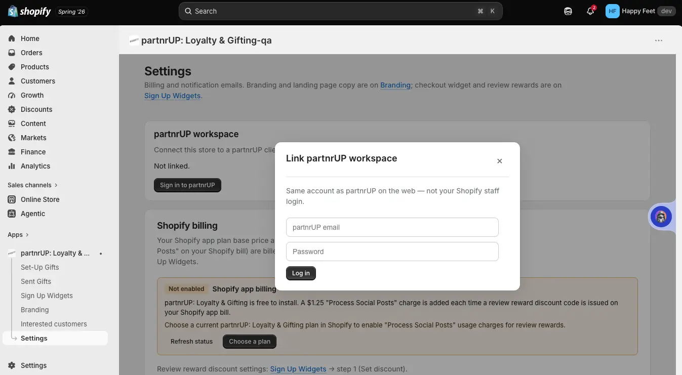 Shopify settings page for partnrUP: Loyalty & Gifting-qa with a modal to link partnrUP workspace.