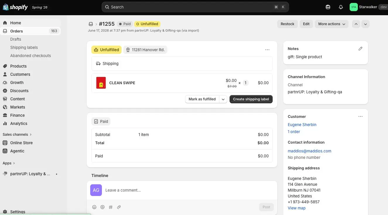 This screenshot shows an order details page within the Shopify platform, specifically for an order managed by the partnrUP: Loyalty & Gifting-qa app. The order is marked as 'Paid' and 'Unfulfilled', with details of the product, customer, and shipping address visible. The interface allows for actions such as marking the order as fulfilled or creating a shipping label.